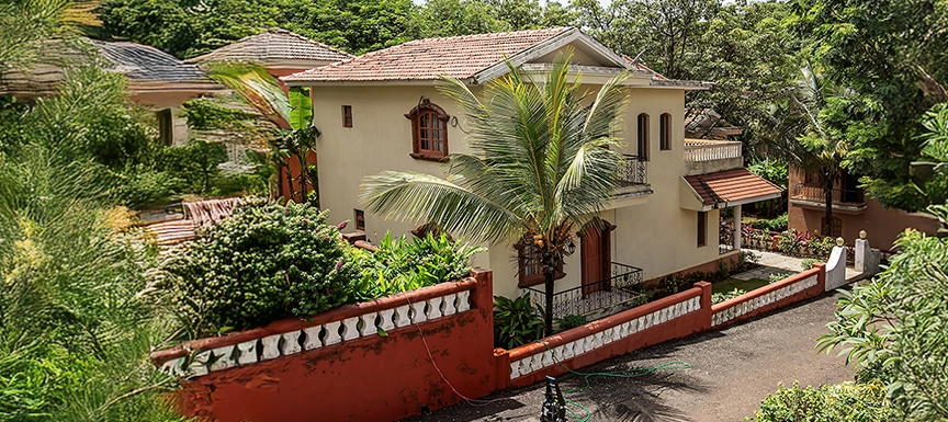 Bold Red and Brown Home Painting in Kerala for a Striking Exterior